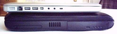Side view - Unibody MacBook on top of PowerBook Pismo