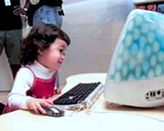 child using Blue Dalmatian iMac