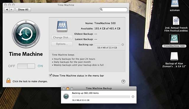 PowerBook's desktop with Time Machin ebacking up to remote volume